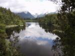 Lake Matheson - View to the cloudy Fox Glacier, Westland Glacier Country, South NZ