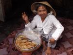 Rice Cakes on offer - Can Tho, Mekong Delta, South Vietnam