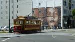 Tram passing mural - Christchurch, New Zealand