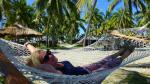 Ralaxing in a gently swaying hammock - Club Fiji Resort, Fiji Island, Viti Levu