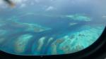 Coral reef and small islands - Pacific Ocean, Air Caledonia aircraft