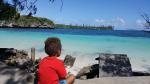   Little boy with red shirt - Kunamera Beach, Ile des Pins, New Caledonia