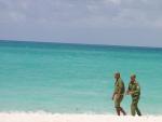 hard work - beach of Cayo Santa Maria, Villa Clara Province, Cuba