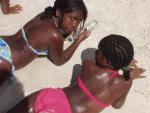 black skin on white sand - beach of Varadero, Matanzas Province, Cuba