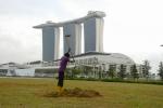 Gardener in front of - Marina Bay Sands Hotel, Singapore