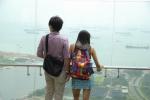 Couple looking down - Marina Bay Sands Hotel, Singapore