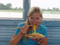 Eating yellow noodles -  Boattrip on Song Huong River, Hué, Central Vietnam